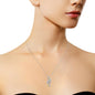 Elegant woman's neckline wearing a silver and gold twisted diamond pendant necklace
