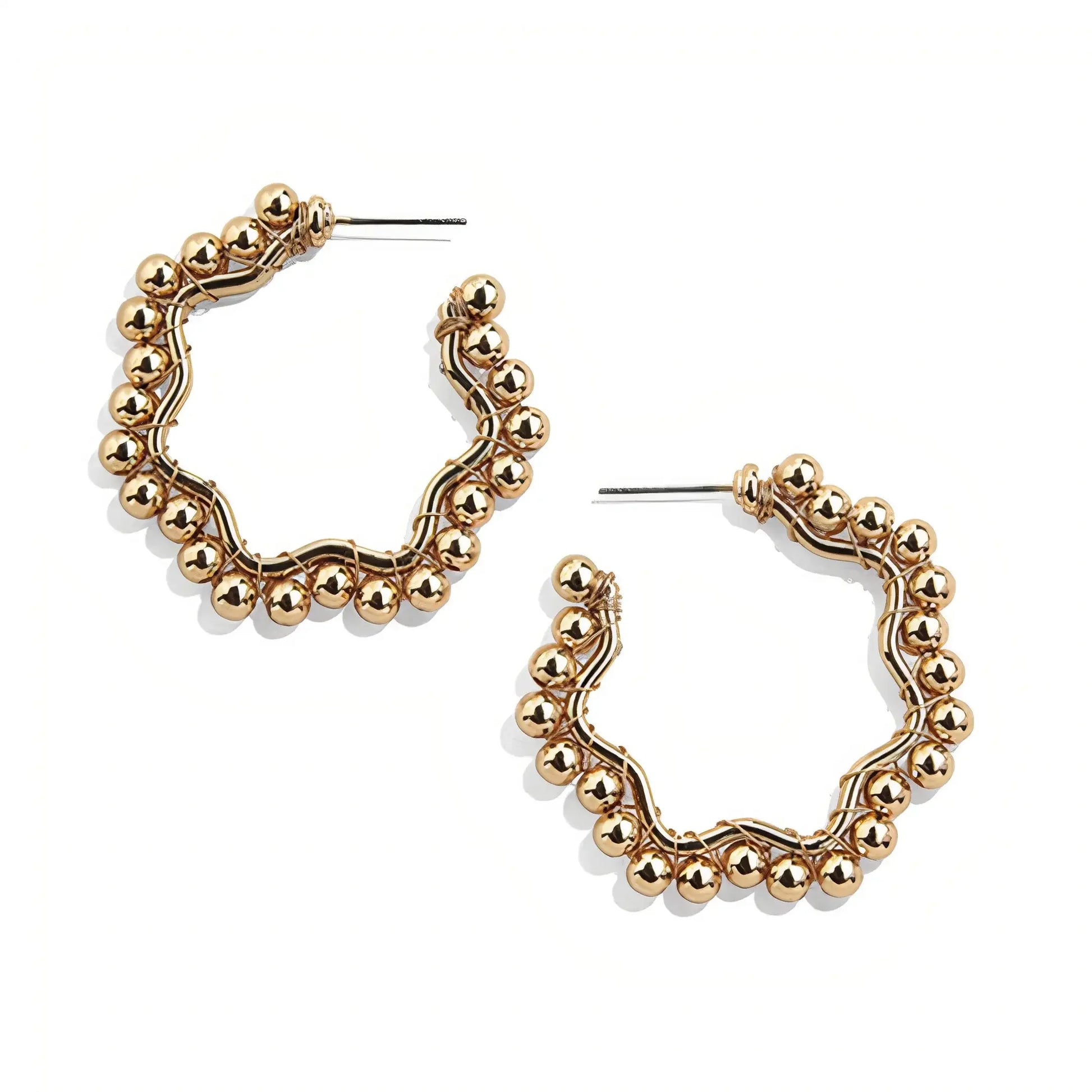 Gold-tone hoop earrings with round bead detailing and twisted wire design on white background
