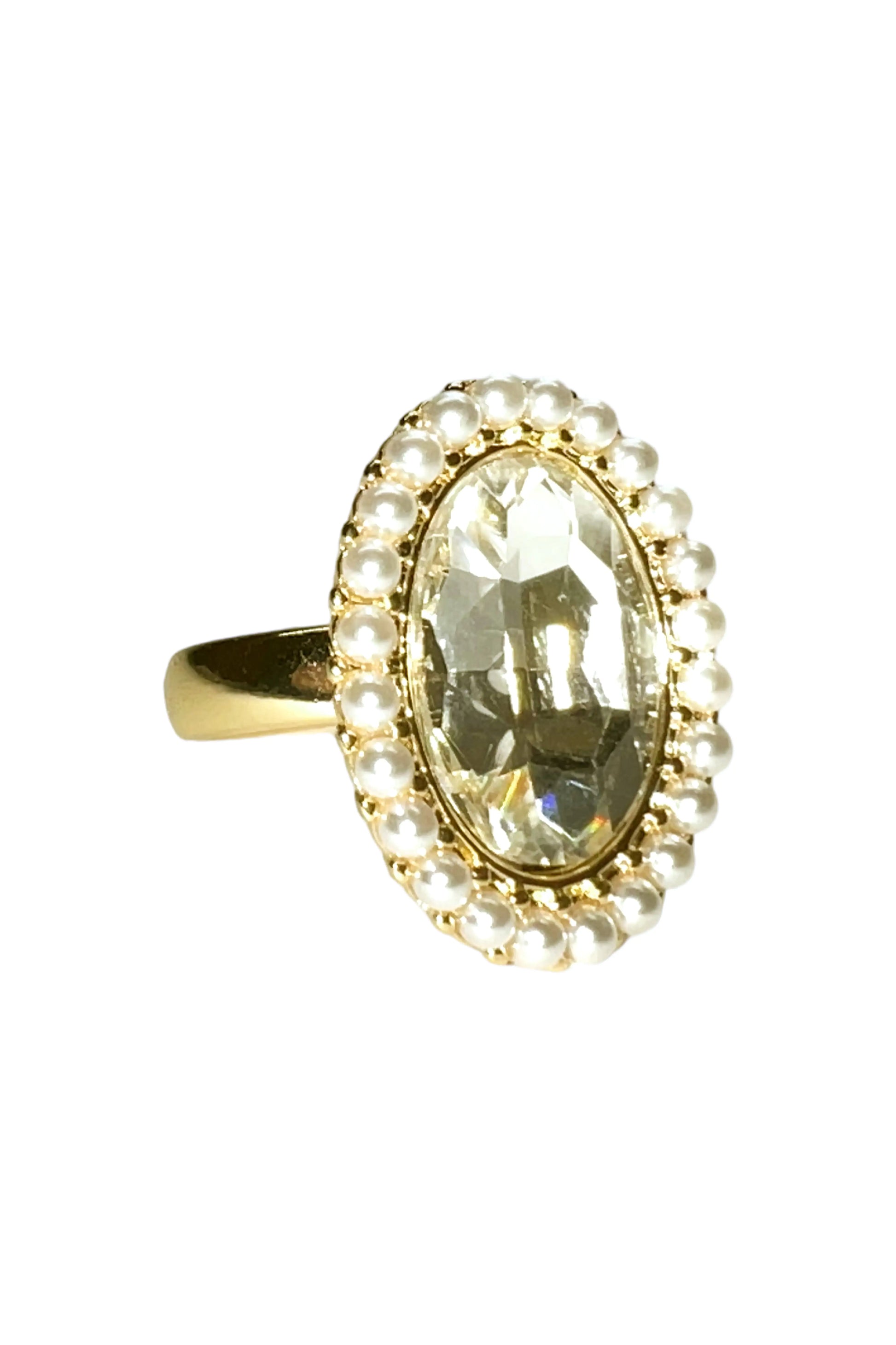 Gold ring with large oval clear gemstone surrounded by small white pearls from Azure Jewelry