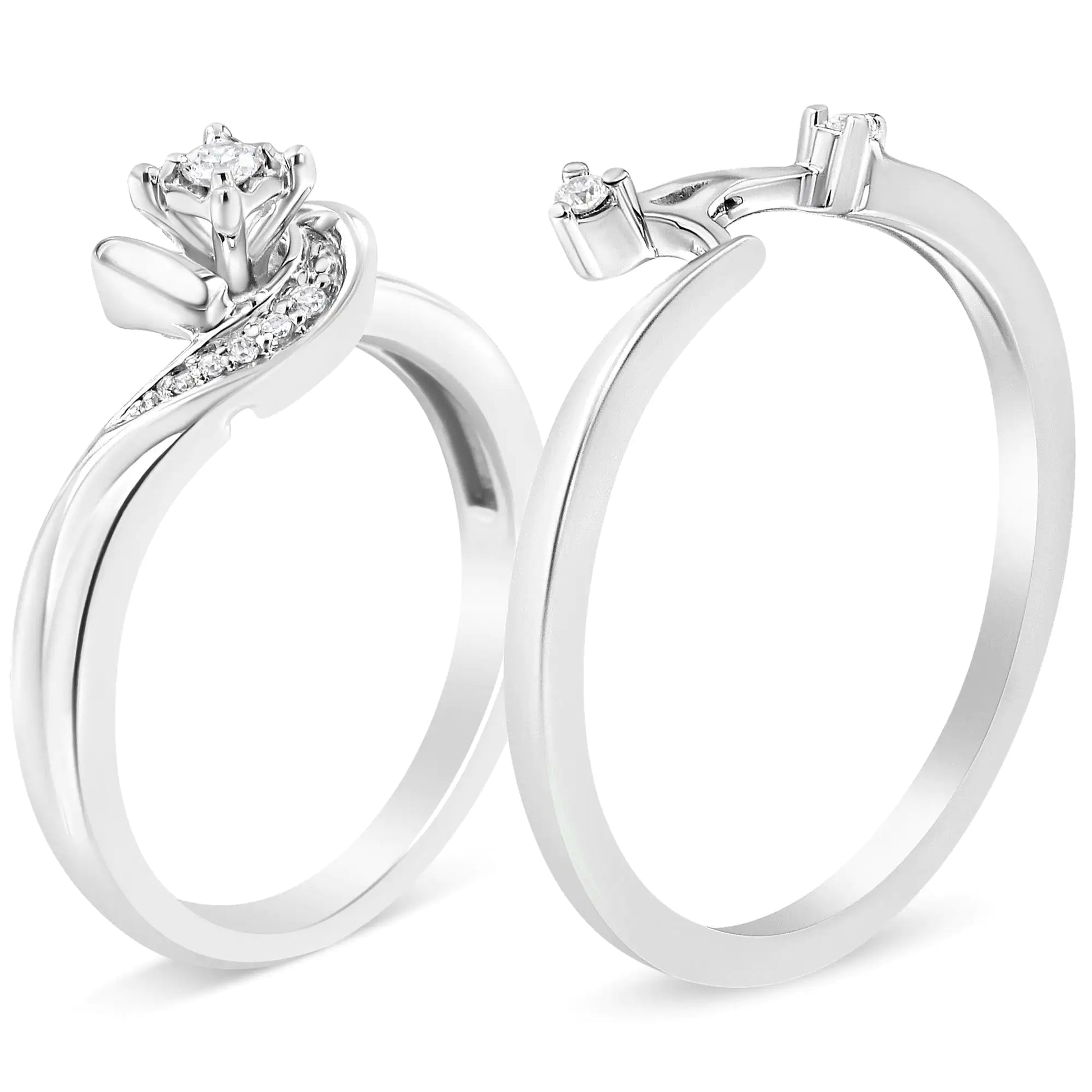 Pair of elegant silver rings with sparkling diamonds on white background, bridal fine jewelry