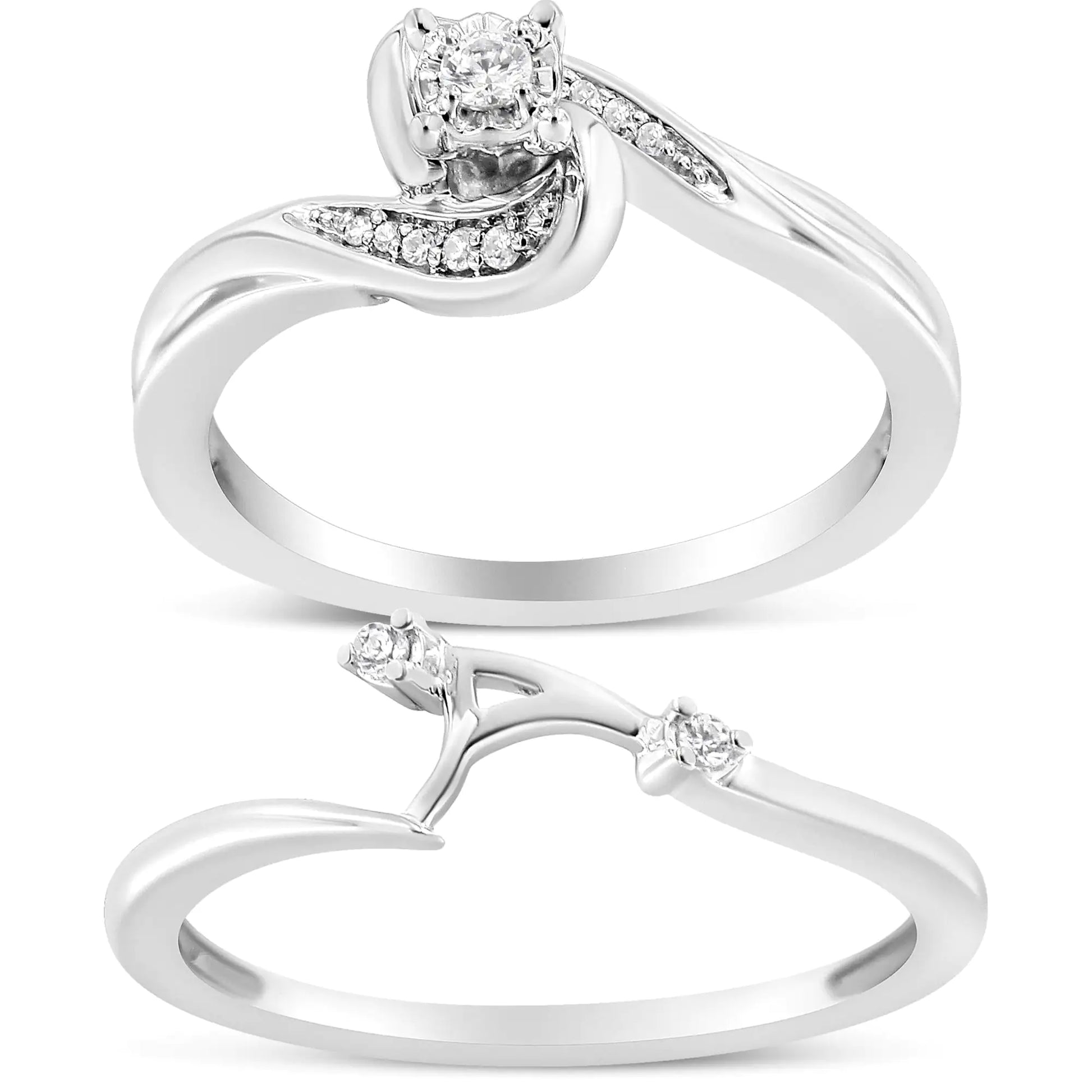 White gold diamond engagement ring with a central round diamond and smaller diamonds on swirling band