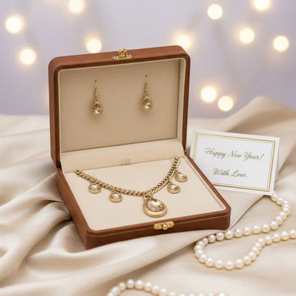 Gold crystal necklace and matching earrings set in luxury gift box with New Year greeting card and pearl necklace