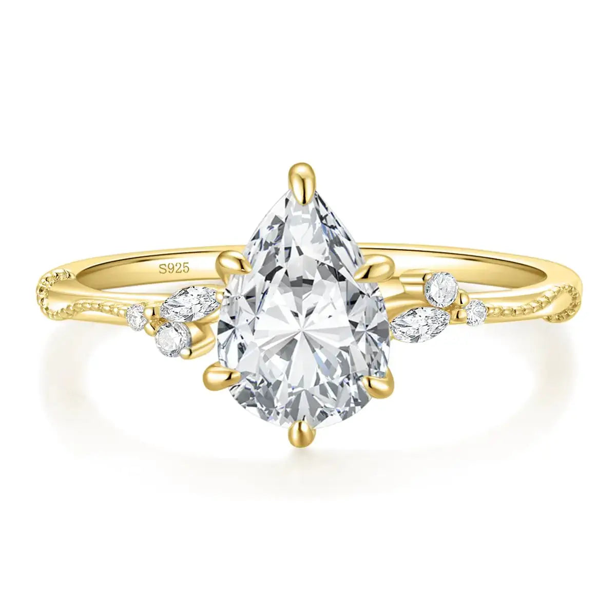 Elegant 18k gold ring with a large pear-shaped diamond and smaller marquise and round diamonds