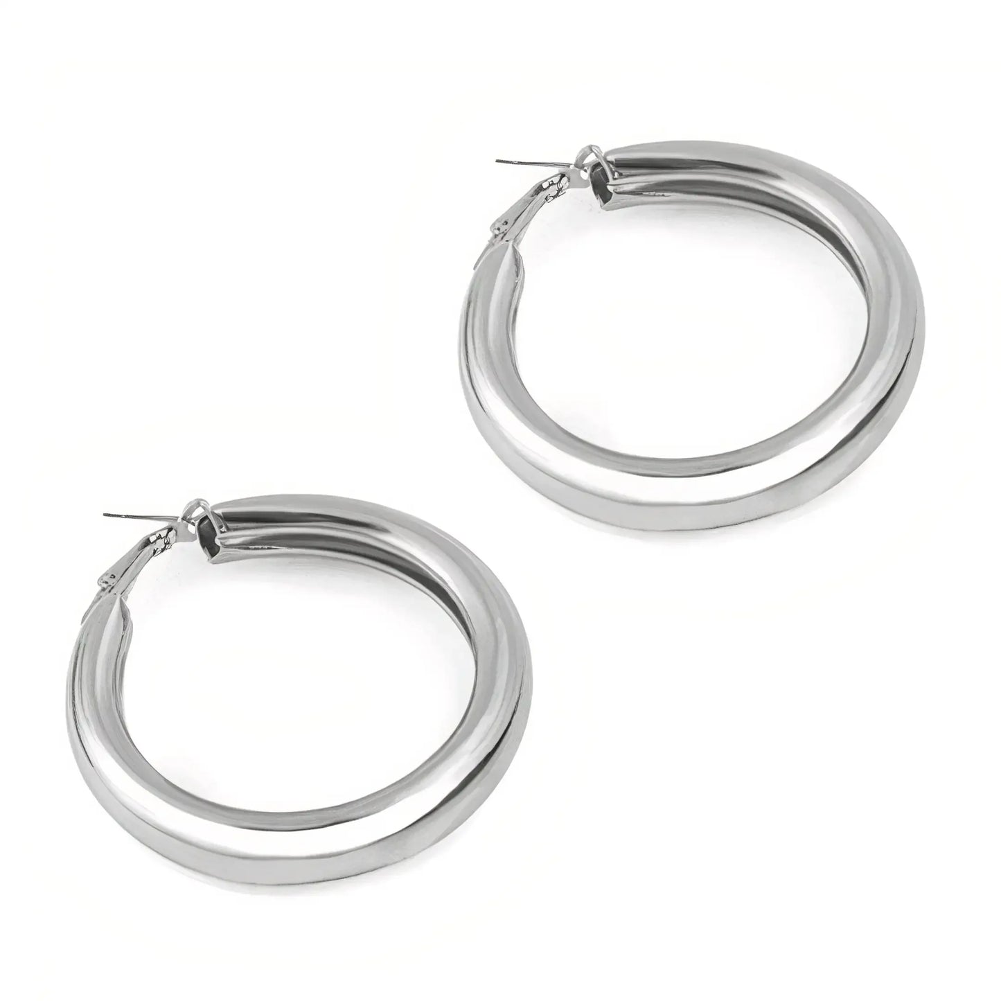 Pair of polished silver hoop earrings with secure clasps on white background