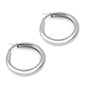 Pair of polished silver hoop earrings with secure clasps on white background