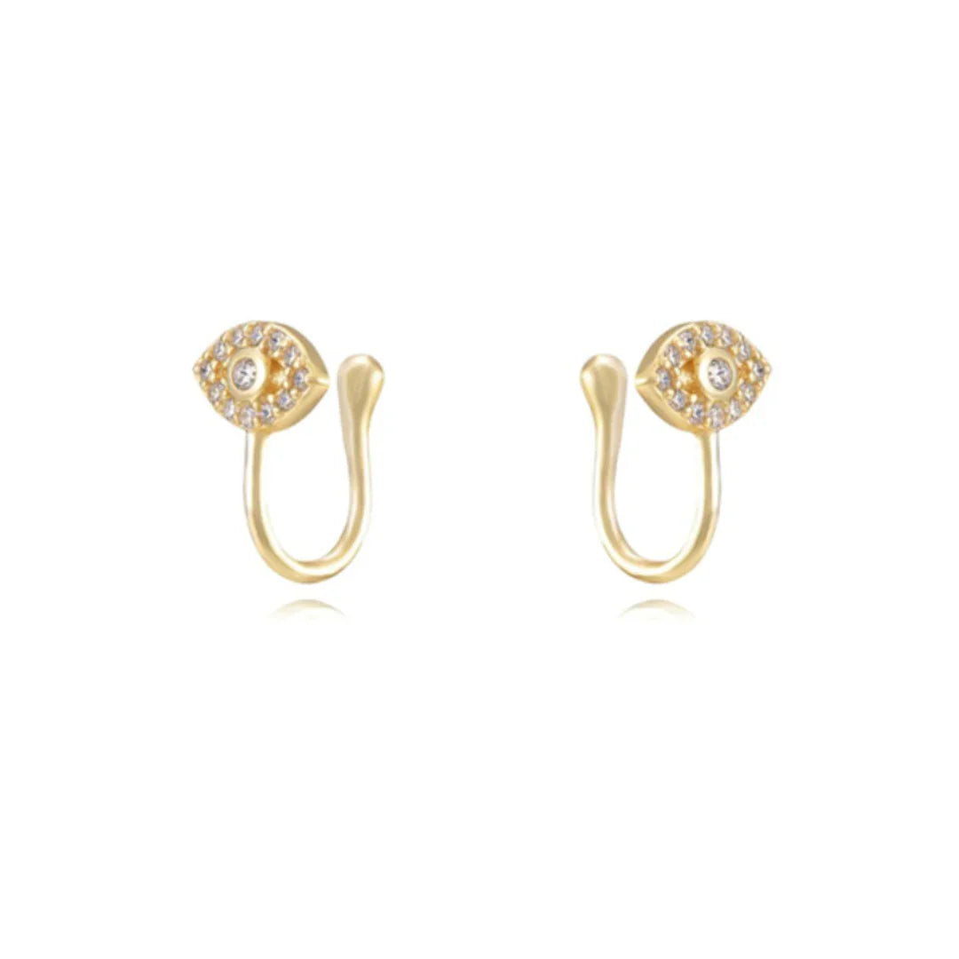 Gold open hoop earrings with eye-shaped design and clear gemstone accents from Azure Jewelry
