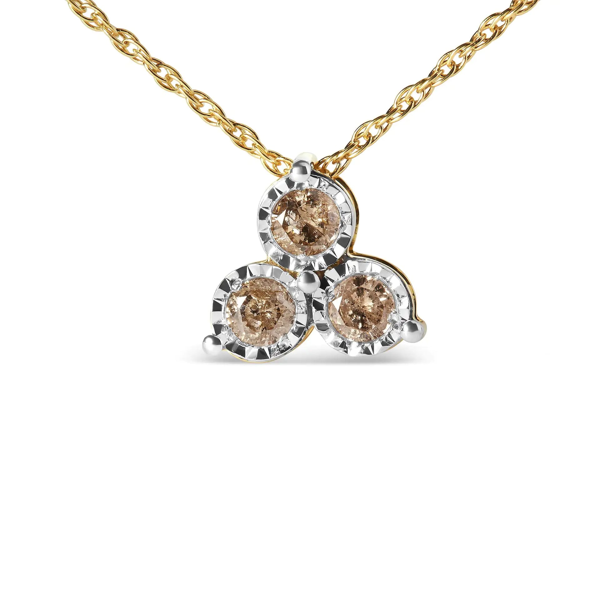 Gold necklace with triad of round champagne gemstones surrounded by silver settings