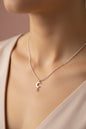 Silver chain necklace with crescent moon and star pendant on elegant neckline